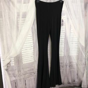 Pretty little thing stretchy bellbottoms with back ruffles